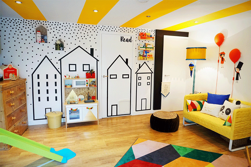 playroom with house wall decor