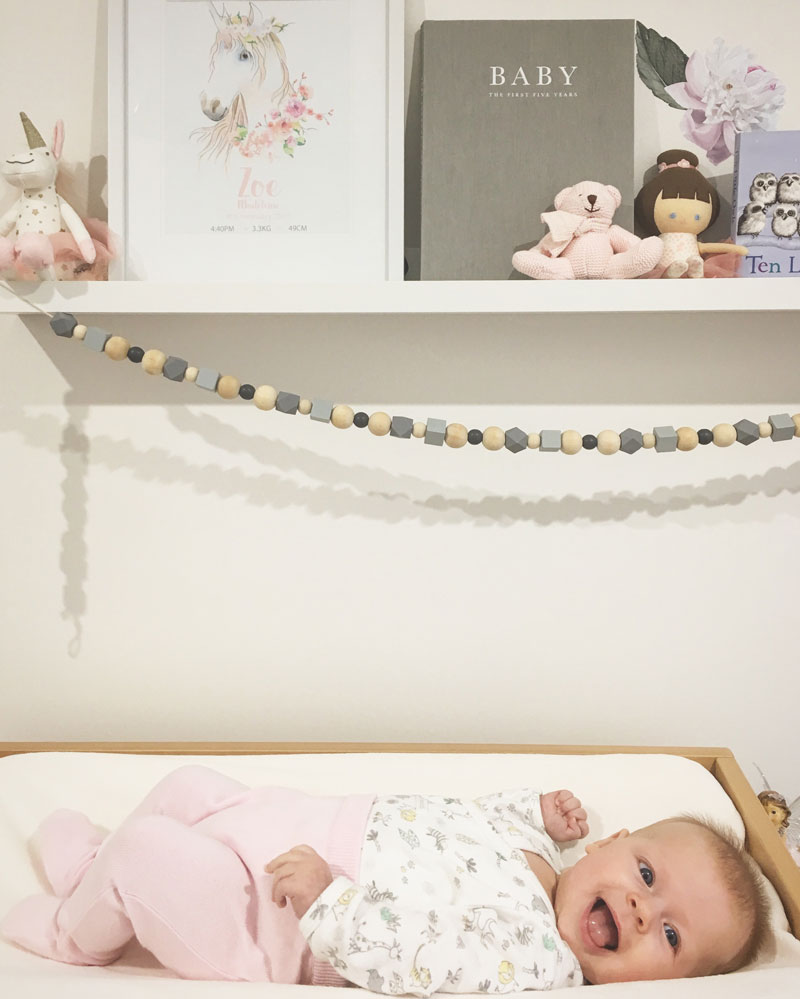 baby on changing table