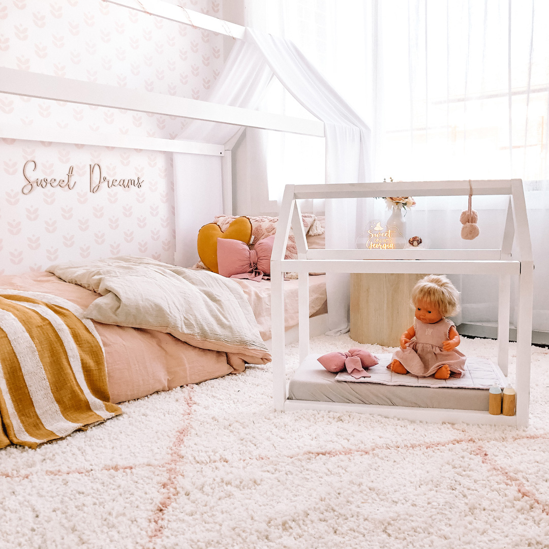 girl's room with peachy pink and ochre
